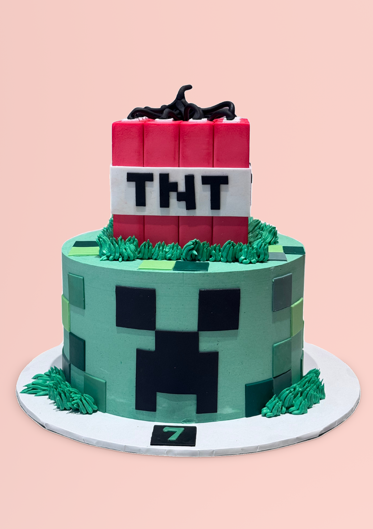 Minecraft Cake with a TNT block topper and creeper face